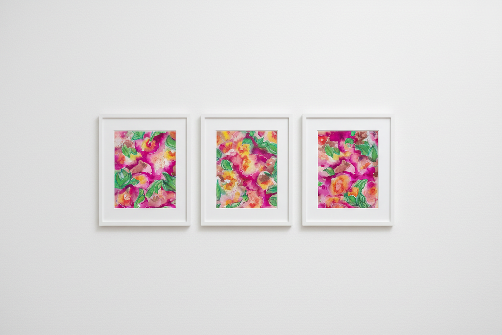 Summer Garden trio gallery wall mockup showing three framed watercolour paintings